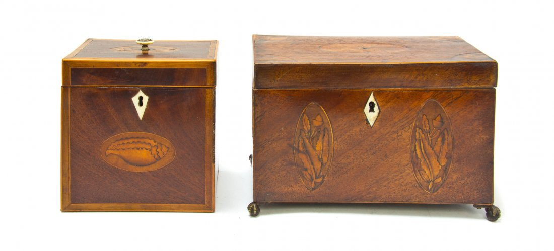 Two Regency Mahogany Marquetry Tea Caddies, Width of wi: Two Regency Mahogany Marquetry Tea Caddies, each of rectangular form, one having shell inlays with an ivory finial and escutcheon, the other with oak leaf and acorn inlays with an ivory escutcheon, ra