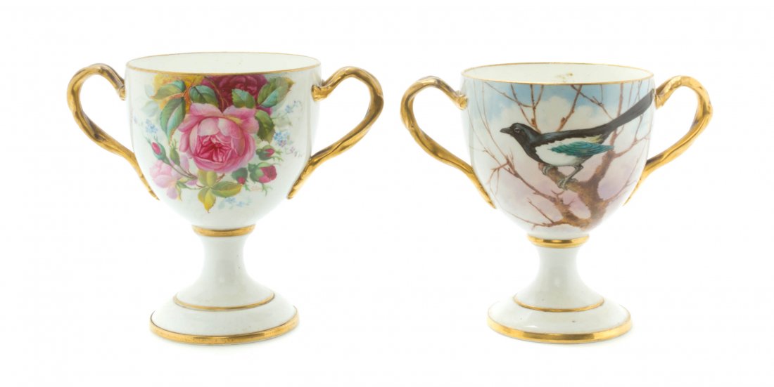 A Pair of Cauldon Porcelain Chalices, Height 7 inches.: A Pair of Cauldon Porcelain Chalices, each with applied gilt handles, the first decorated with birds, the other flowers. Height 7 inches. Property from the Estate of Marvin and Margaret Katz, Naples, 