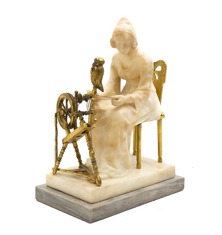 An Italian Alabaster and Gilt Bronze Figural Group, Wid: An Italian Alabaster and Gilt Bronze Figural Group, depicting a woman in a bonnet seated at her spinning wheel. Width overall 8 3/8 inches.