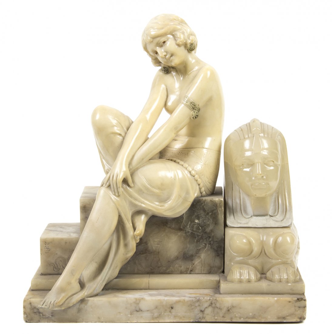 An Art Deco Alabaster Figural Lamp, Width 13 1/2 inches: An Art Deco Alabaster Figural Lamp, in the Egyptian revival style, depicting a maiden seated beside a sphinx. Width 13 1/2 inches.