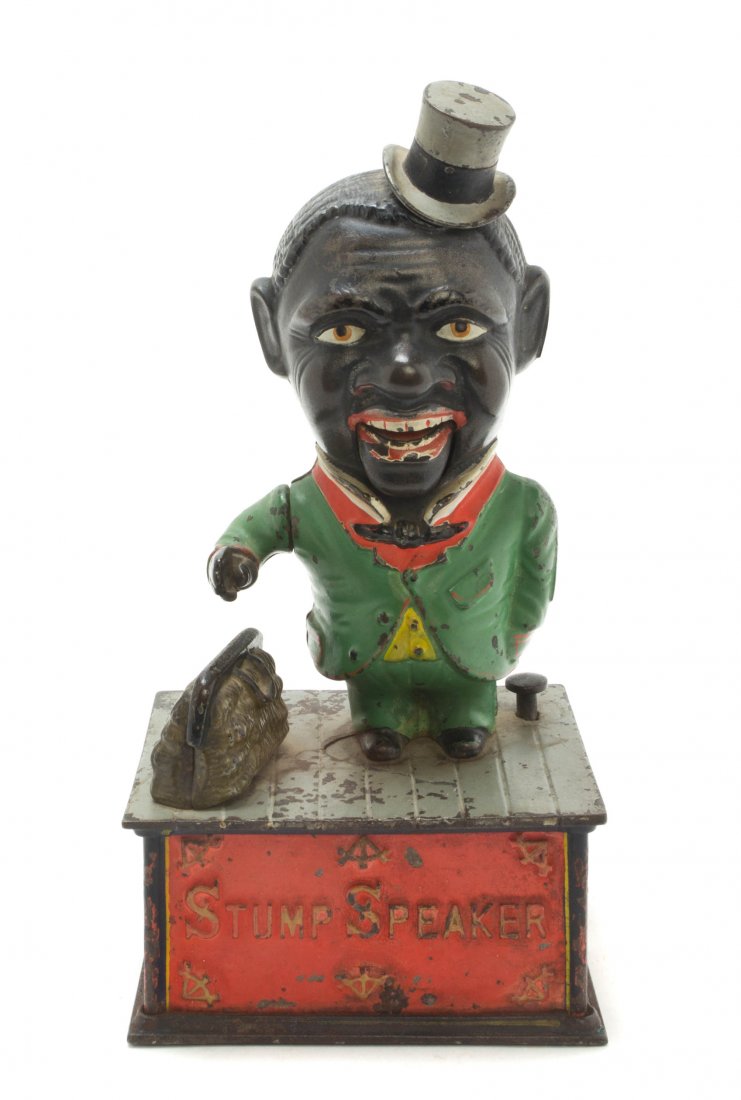 An American Cast Iron and Polychrome Painted Mechanical: An American Cast Iron and Polychrome Painted Mechanical Bank, Shepard Hardware Co., Stump Speaker, designed by Charles Shepard and Peter Adams, the standing figure with a jointed mouth and arm, standi