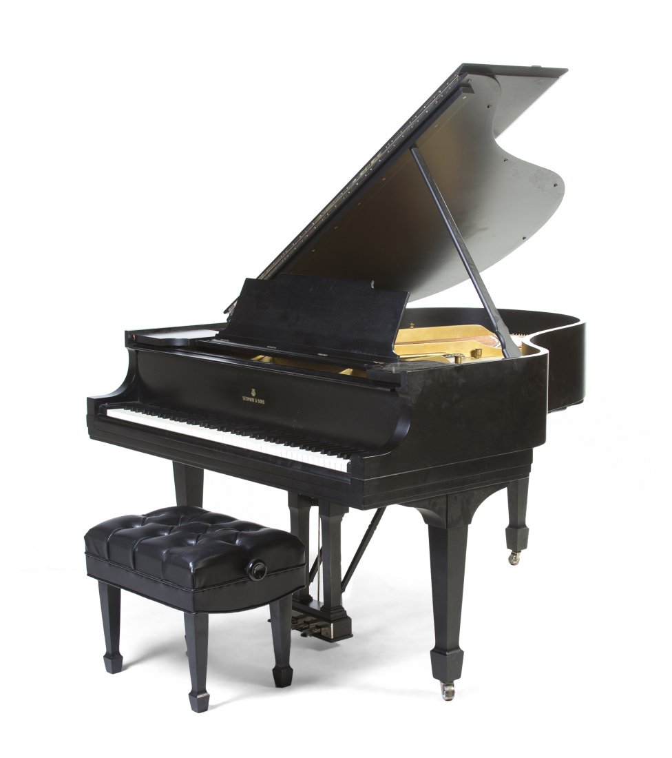 A Steinway & Sons Baby Grand Piano, Length approximatel: A Steinway & Sons Baby Grand Piano, 1924, serial number 234298, having an ebonized case raised on square tapering legs, with a conforming adjustable bench. Length approximately 58 inches. Property fro