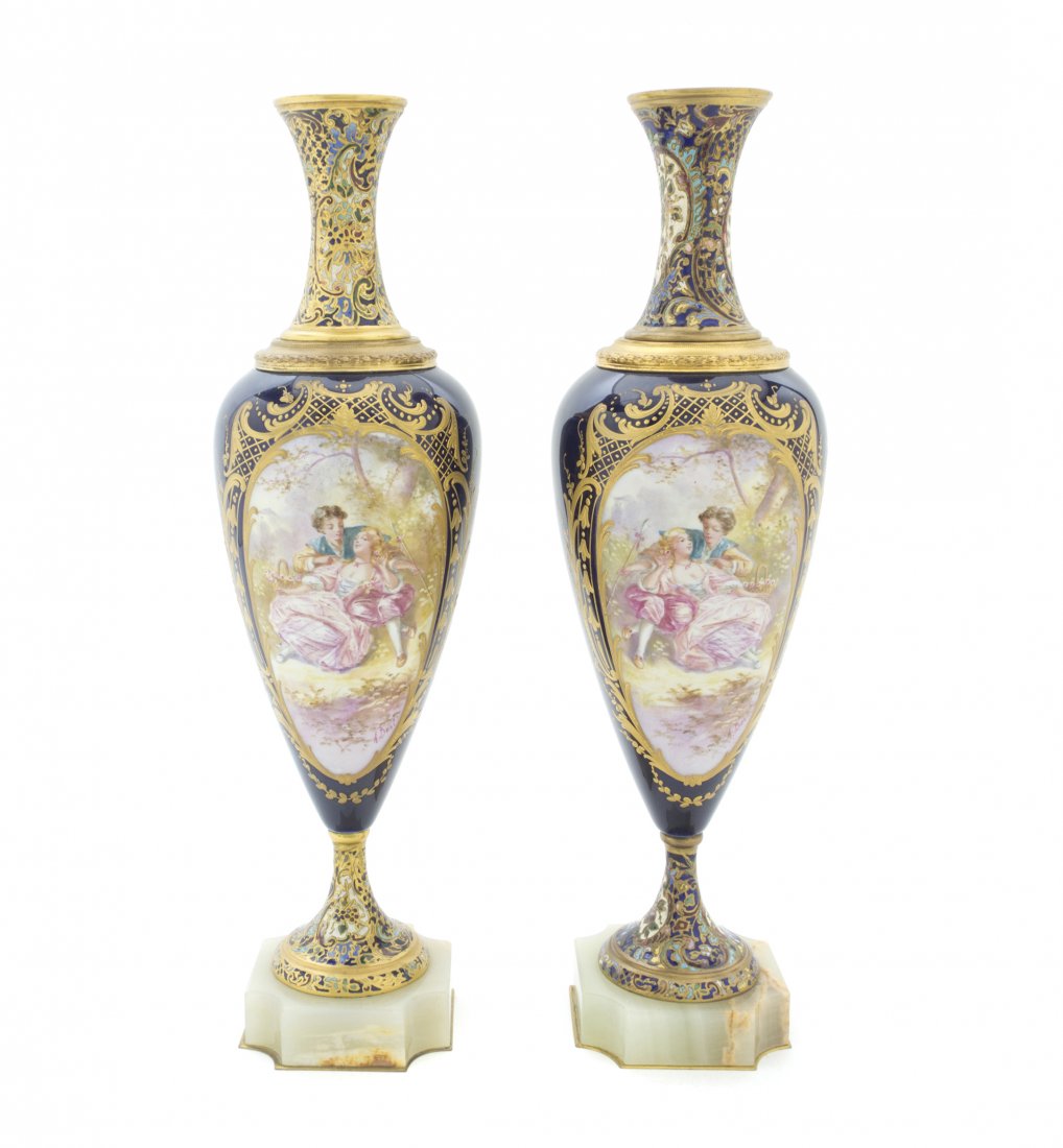 A Pair of French Champleve and Porcelain Vases, Height : A Pair of French Champleve and Porcelain Vases, each of baluster form, decorated on one side with a landscape and the other with a scene of courting couples, signed A. Bost, with gilt highlights on a