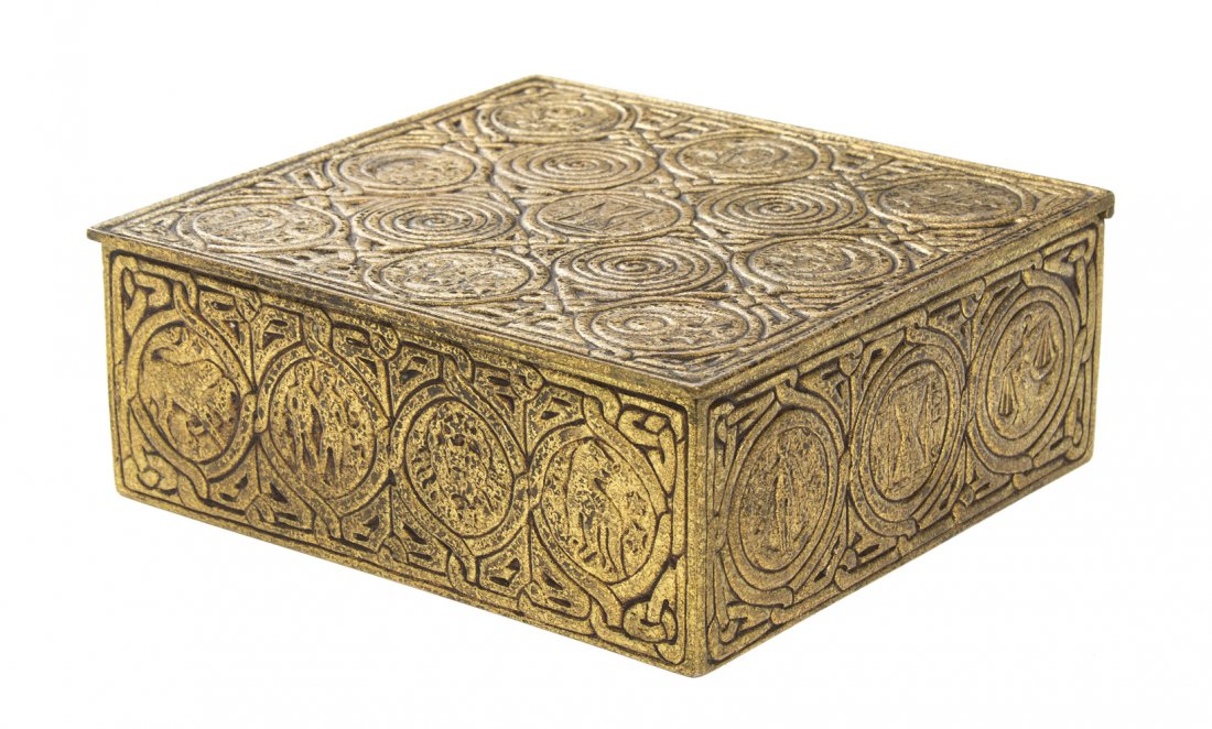 A Tiffany Studios Dore Bronze Humidor, Width 6 1/2 inch: A Tiffany Studios Dore Bronze Humidor, in the Zodiac pattern, of square form, stamped Tiffany Studios, New York, 1655. Width 6 1/2 inches.