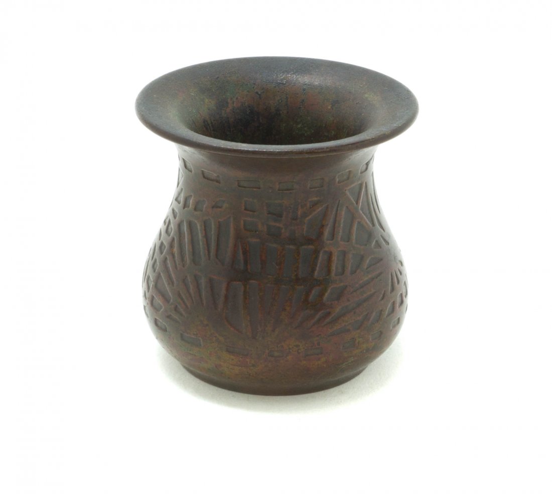 A Tiffany Studios Patinated Bronze Inkwell, Height 2 1/: A Tiffany Studios Patinated Bronze Inkwell, in the Pine Needle pattern, stamped Tiffany Studios, New York, 982. Height 2 1/4 inches.