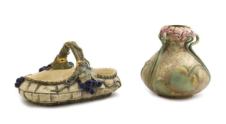 An Art Nouveau Amphora Pottery Vase, Height of first 7: An Art Nouveau Amphora Pottery Vase, with applied foliate decoration, together with an amphora basket with grapevine decoration. Height of first 7 1/4 inches.