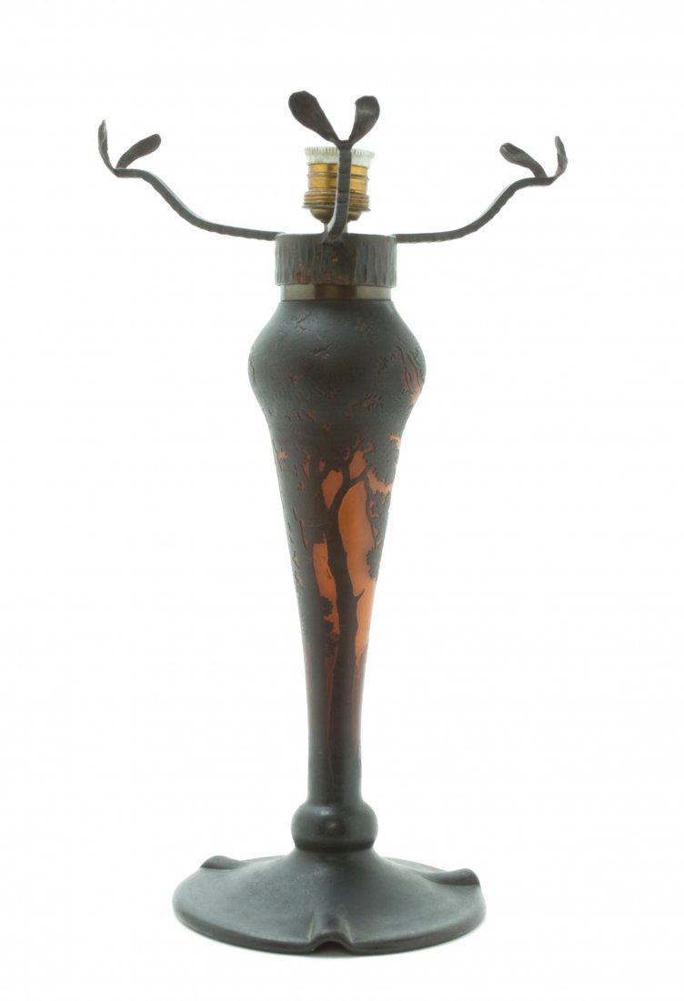 A Muller Freres Cameo Glass Lamp Base, Height 17 inches: A Muller Freres Cameo Glass Lamp Base, of inverted baluster form with a circular foot, decorated with a continuous landscape, having an etched signature. Height 17 inches.
