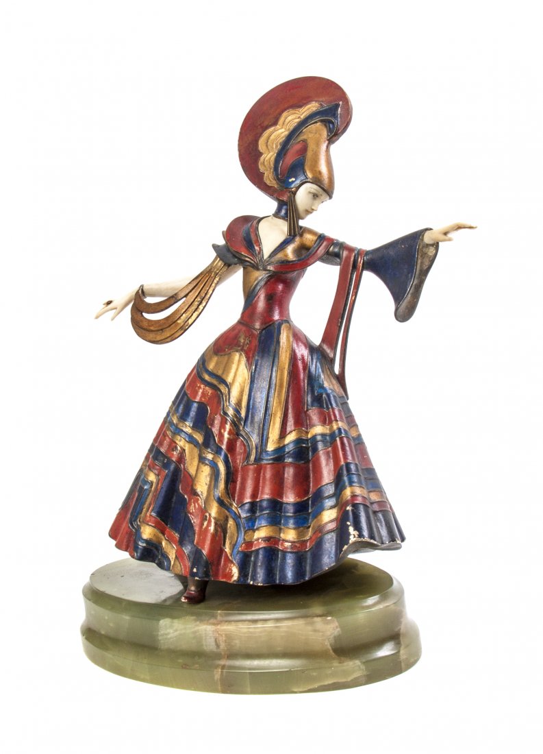 An Austrian Art Deco Cold Painted Bronze and Ivory Scul: An Austrian Art Deco Cold Painted Bronze and Ivory Sculpture, Gerdago (Gerda Iro), Danseuse, depicting a dancing maiden, raised on an oval onyx base, signed. Height overall 12 1/8 inches.