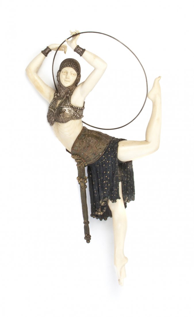 A French Bronze and Ivory Figure, attributed to Demetre: A French Bronze and Ivory Figure, attributed to Demetre H. Chiparus (Romanian, 1886-1947), Dancer with Ring, depicting an Art Deco maiden with cold painted decoration, lacking base, unsigned. Height o