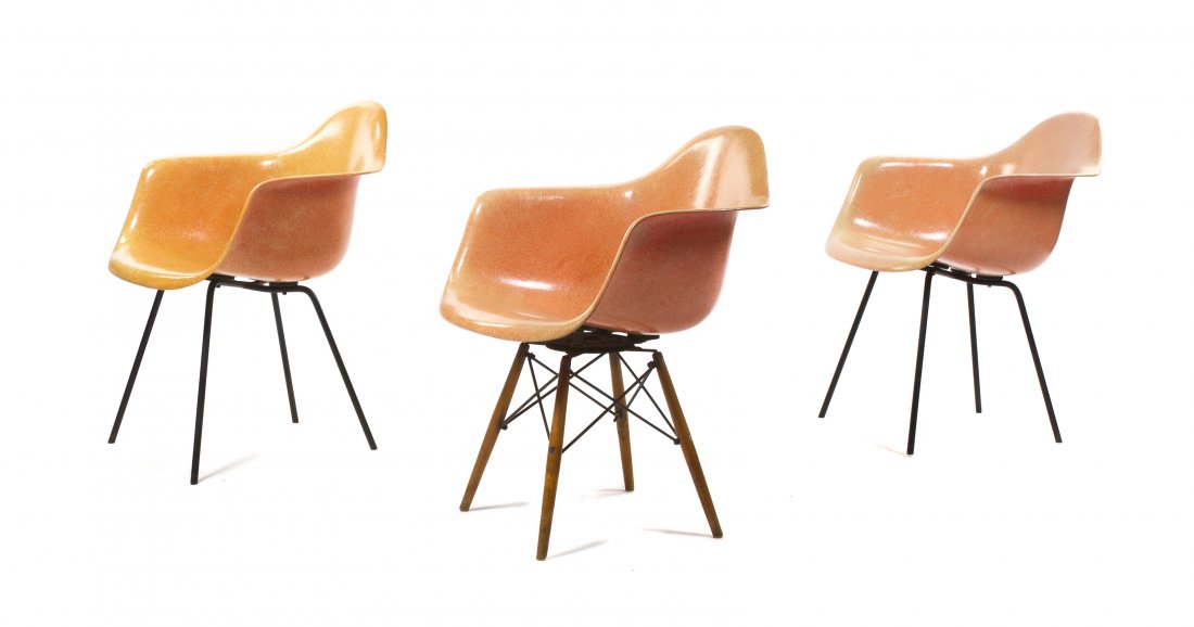 Three Charles and Ray Eames Fiberglass Chairs, for Herm: Three Charles and Ray Eames Fiberglass Chairs, for Herman Miller, 1950s, each with a molded back and seat, the first a PAW example with a swivel seat raised on an Eiffel Tower base, and two DAX exampl