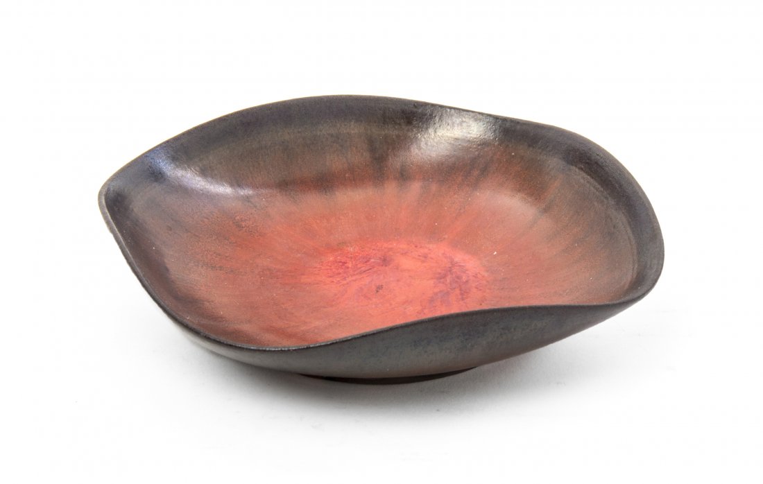 An Otto and Gertrude Natzler Ceramic Bowl, Width 5 1/4 : An Otto and Gertrude Natzler Ceramic Bowl, of square form with a red glaze. Width 5 1/4 inches.