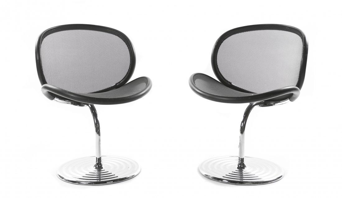 A Pair of German Chromed Aluminum O-Linie Chairs, Herbe: A Pair of German Chromed Aluminum O-Linie Chairs, Herbert Ohl (1926-2012), each with a circular mesh back and seat, over a tubular standard raised on a circular base, one with an original label to bas
