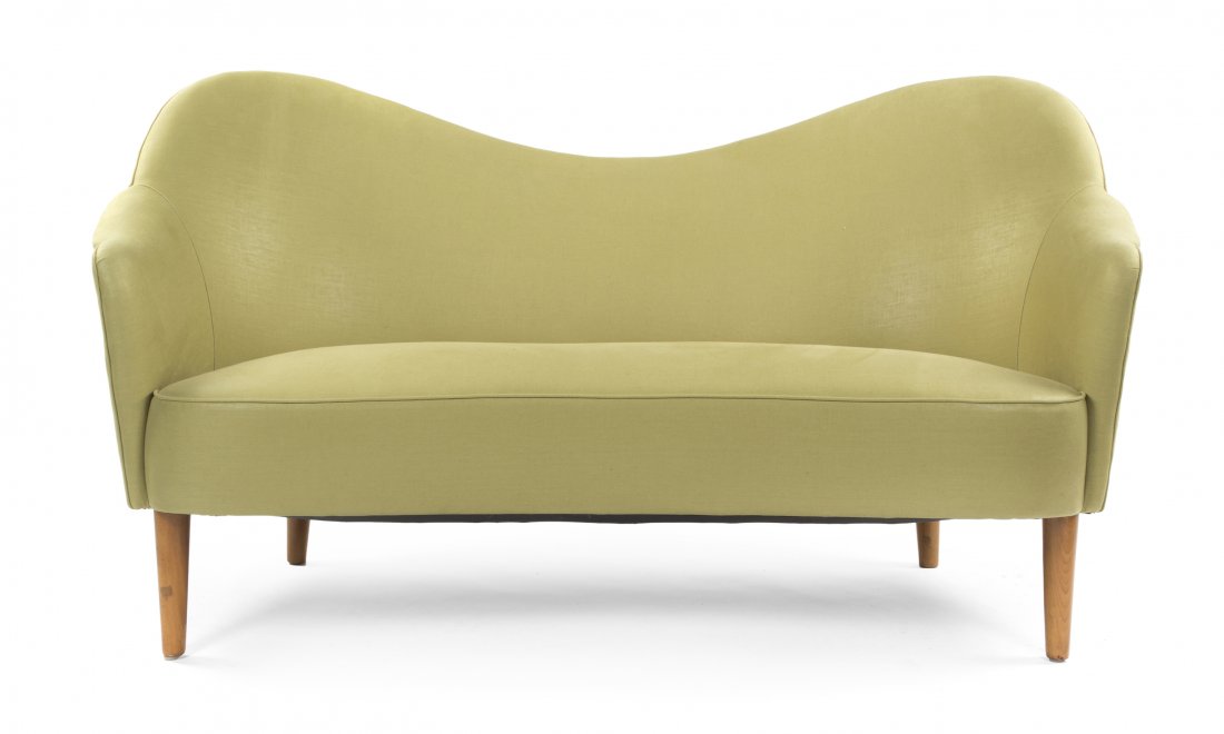 A Swedish Camelback Upholstered Sofa, Carl Malmsten (18: A Swedish Camelback Upholstered Sofa, Carl Malmsten (1888-1972), with an upholstered back, arms and seat, raised on tapering cylindrical legs. Height 32 1/4 x width 59 3/4 x depth 30 inches.