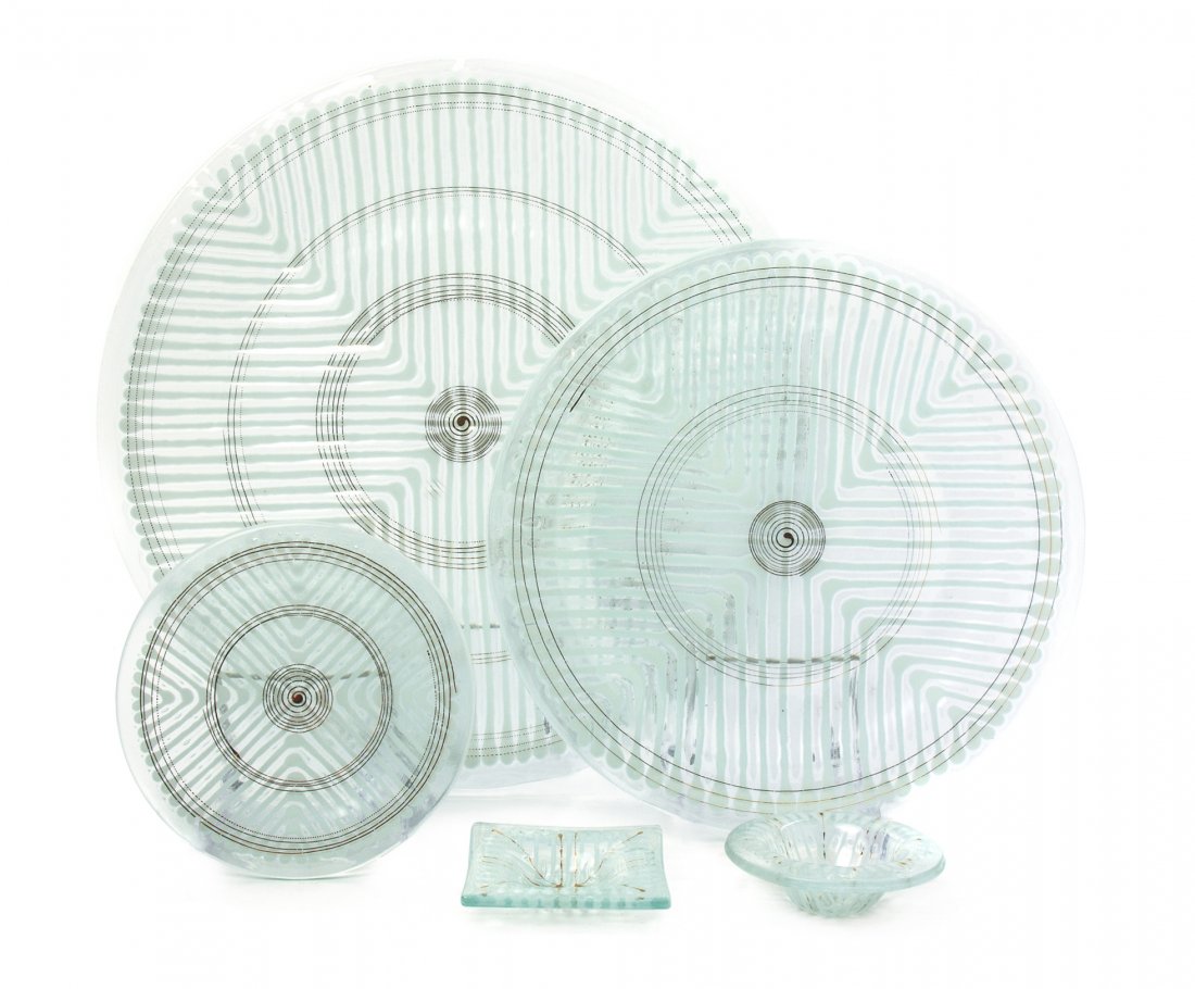 An American Studio Glass Partial Dinner Service, Higgin: An American Studio Glass Partial Dinner Service, Higgins, comprising 12 dinner plates, 12 salad plates, 4 ash receivers, 4 finger bowls and a serving tray; 33 items total. Diameter of first 11 1/4 inc
