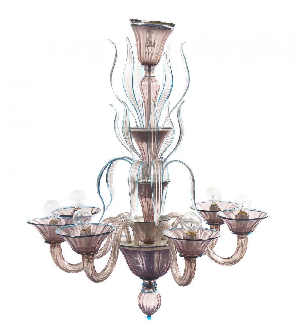 An Italian Studio Glass Six-Light Chandelier, Paolo Ven: An Italian Studio Glass Six-Light Chandelier, Paolo Venini (1895-1959), having a repeating baluster standard, issuing S-scroll arms and having stylized leaf decoration in three tiers. Height 32 inches