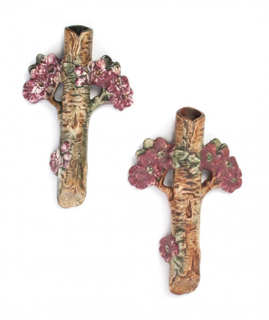 Two Weller Pottery Wall Pockets, Height 9 1/2 inches.: Two Weller Pottery Wall Pockets, each in the Woodcraft pattern, with floral decoration, one marked Weller. Height 9 1/2 inches. Property from the Estate of Ms. Jacqueline Kuznicki, Chicago, Illinois
