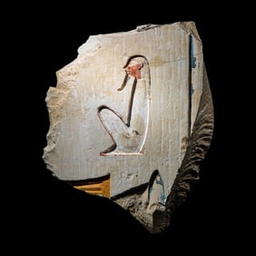 An Egyptian Painted Limestone Relief Fragment