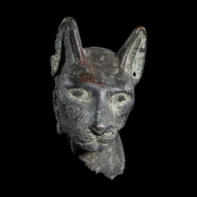 An Egyptian Bronze Head of a Cat