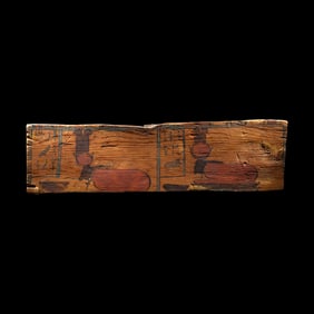 An Egyptian Wood Sarcophagus Fragment