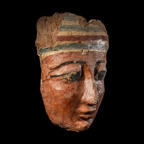 An Egyptian Painted Wood Mummy Mask