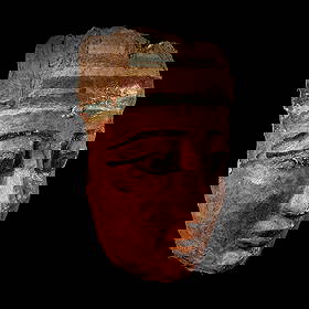 An Egyptian Painted Wood Mummy Mask: An Egyptian Painted Wood Mummy Mask Ptolemaic Period, 304-30 B.C. Height 25.5 cm (10 inches). Provenance: Ira & Larry Goldberg Auction, Los Angeles, Ancient and World Coins, 29 October 2009, Lot 8