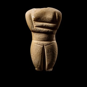 A Cycladic Marble Female Torso