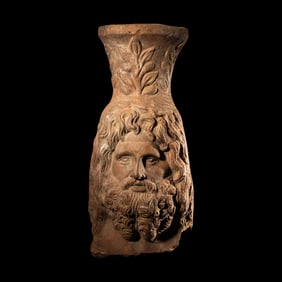 A Romano-Egyptian Terracotta Head of Serapis