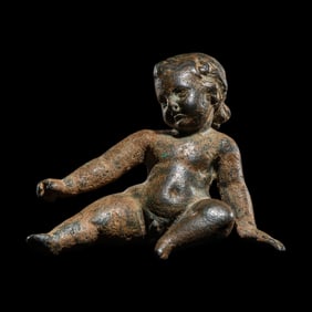 A Roman Bronze Seated Child