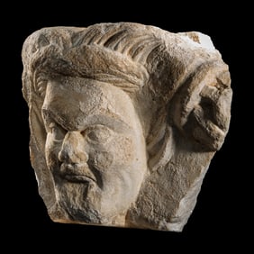 A Roman Marble Relief Fragment with the Head of a Satyr