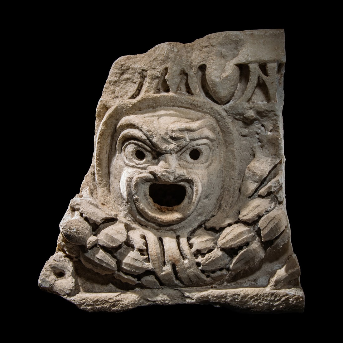 A Roman Marble Relief Fragment with an Actor's Mask (1 of 5)