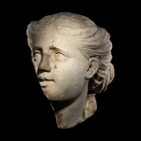 A Roman Marble Head of a Goddess