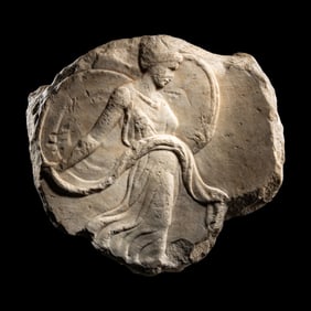 A Roman Marble Oscillum with a Dancing Maenad