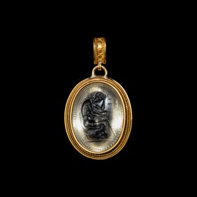 An Etruscan Revival Gold and Rock Crystal Pendant