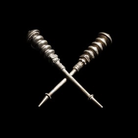 A Pair of Etruscan or Greek Silver Pins