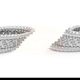 VAN CLEEF & ARPELS, 'PERLÉE' DIAMOND AND WHITE GOLD RING: VAN CLEEF & ARPELS, 'PERLÉE' DIAMOND AND WHITE GOLD RING Pavé-set round diamonds weighing approximately 1.10 carats total. 18 karat white gold. Ring size 5 1/2. Stamp: VCA Au750 50 JE 14