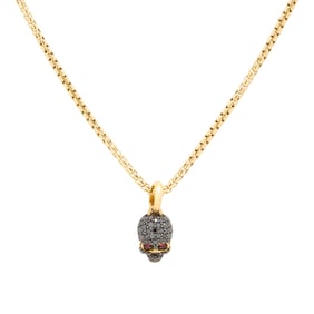 DAVID YURMAN, BLACK DIAMOND, RUBY, AND YELLOW GOLD 'MEMENTO MORI' SKULL PENDANT NECKLACE