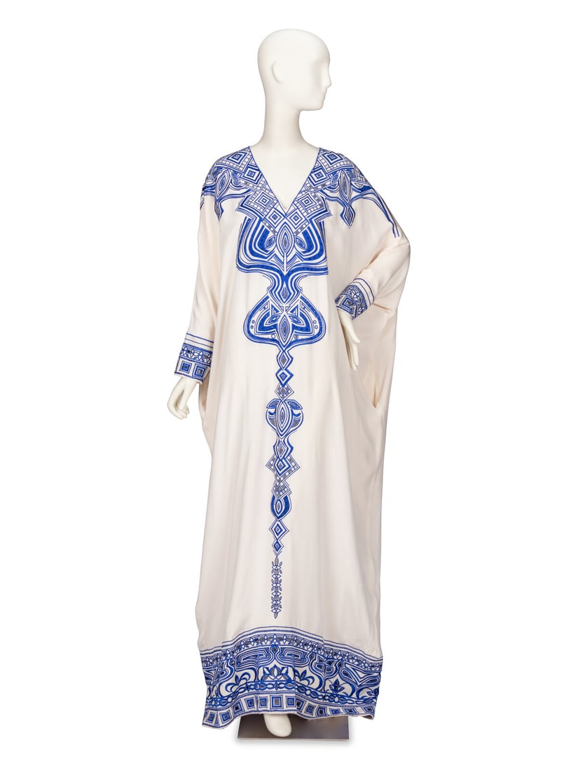 EMILIO PUCCI, EMBROIDERED KAFTAN: EMILIO PUCCI, EMBROIDERED KAFTAN Kaftan in white silk crêpe de chine with cobalt blue embroidery and cutwork throughout. V neckline. Full-length incorporated dolman sleeves. Two in-seam pockets a