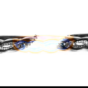 SAPPHIRE, DIAMOND, AND YELLOW GOLD BANGLE BRACELET: SAPPHIRE, DIAMOND, AND YELLOW GOLD BANGLE BRACELET Round sapphires, old European cut diamonds, and blue enamel, hinged with side clasp. Yellow gold and silver. 6 3/8 inches inner circumference. Gross