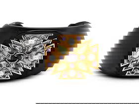 BLACK JADE, GREEN TOURMALINE, AMETHYST, AND CULTURED PEARL CUFF BRACELET: BLACK JADE, GREEN TOURMALINE, AMETHYST, AND CULTURED PEARL CUFF BRACELET Pear shape cabochon green tourmalines, round amethysts, oval amethyst cabochon, cultured pearls, and black jade. Yellow gold. 6