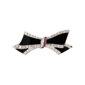 ONYX, RUBY, AND DIAMOND BOW BROOCH