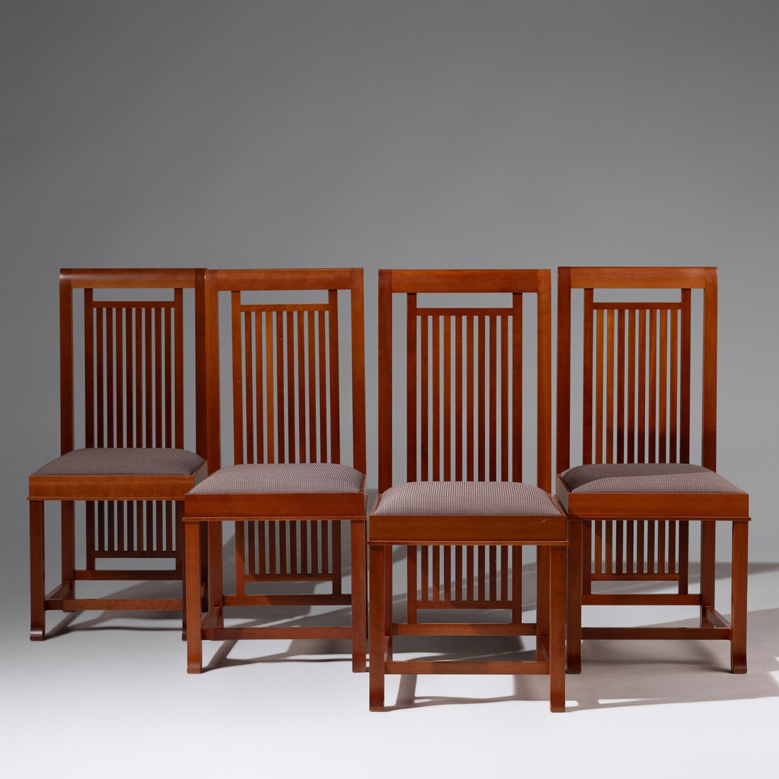 Frank Lloyd Wright (American, 1867–1959) Set of 4 '614 Coonley 2' dining chairs Cassina, (1 of 2)