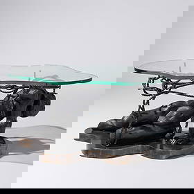 Philip and Kelvin LaVerne (American, 1907–1987 | 1936–2025) Persephone Enslaved coffee: Philip and Kelvin LaVerne (American, 1907–1987 | 1936–2025) Persephone Enslaved coffee table, c. 1965 bronze, glass etched signature to base 18 h × 36 w × 22 d in (46 × 91 &