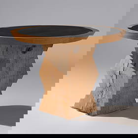 Christian Liaigre (French, 1943–2020) Nagato side table, c. 1990: Christian Liaigre (French, 1943–2020) Nagato side table, c. 1990 carved oak, slate no visible marks or signatures 29 h × 40 dia in (74 × 102 cm)