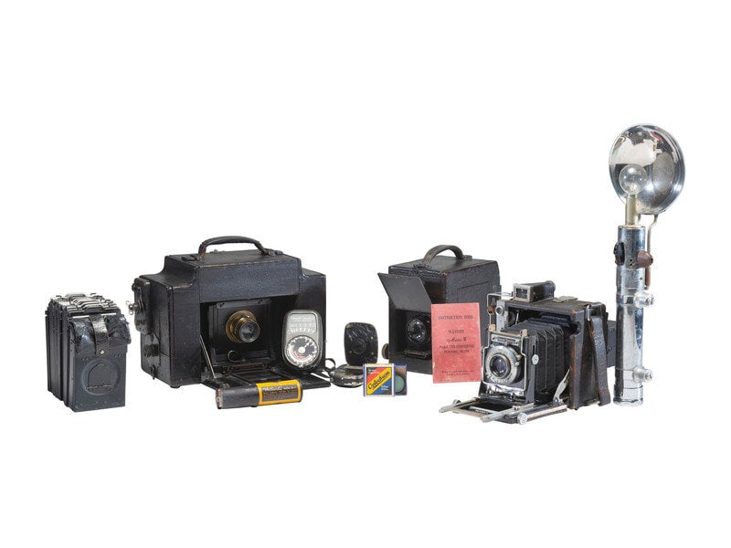 [CAMERAS]. Trio of Graflex and Speed Graphic cameras. : [CAMERAS]. Trio of Graflex and Speed Graphic cameras. Miniature Speed Graphic camera made by Folmer Graflex Corporation, Rochester, NY. With lens marked "Kodak Ektar f:4.5 101mm ES5485." Size 3 x 5 x