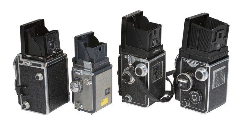 [CAMERAS]. 4 Twin Lens Reflex cameras with related material, incl. two Rolleiflex cameras.  (1 of 4)