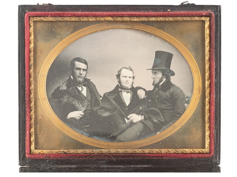 [EARLY PHOTOGRAPHY]. Three daguerreotypes of pairs and trios, incl. a group of distinguished men.  (1 of 2)