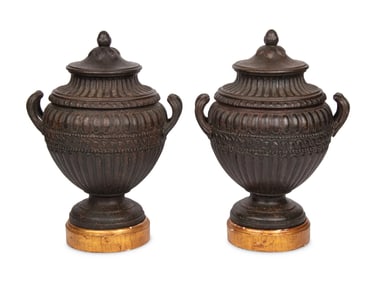 A Pair of Continental Cast Iron Urns