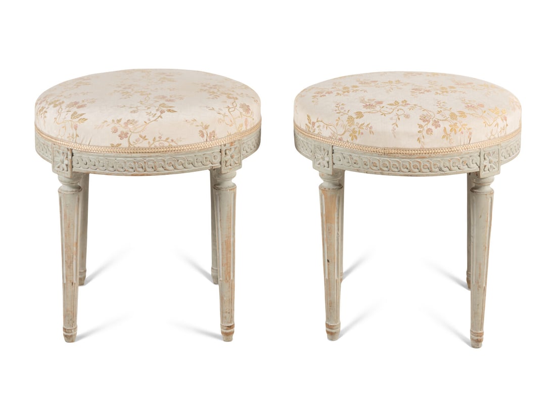 A Pair of Louis XVI Grey-Painted Tabourets: A Pair of Louis XVI Grey-Painted Tabourets Late 18th Century Height 18 x diameter 18 inches. Property from Camp Rosemary, the Estate of Posy Krehbiel, Lake Forest, Illinois This lot is located in Chic