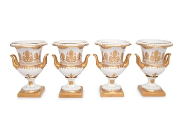 A Set of Four Gilt-Decorated Porcelain Urns