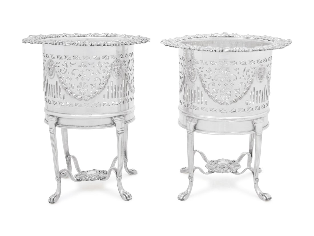 A Pair of English Silver-Plate Wine Coolers: A Pair of English Silver-Plate Wine Coolers 19th Century Height 8 1/2 inches. Property from Camp Rosemary, the Estate of Posy Krehbiel, Lake Forest, Illinois This lot is located in Chicago. Camp Rosem